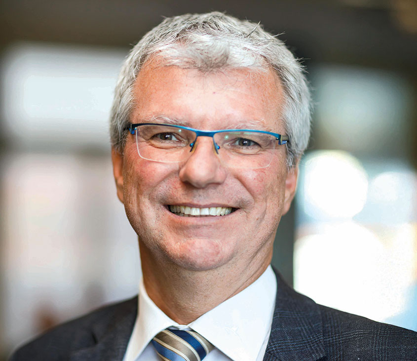 Am Foto ist Herr Mag. Gerhard Hofbauer von der Caritas Steiermark zu sehen.